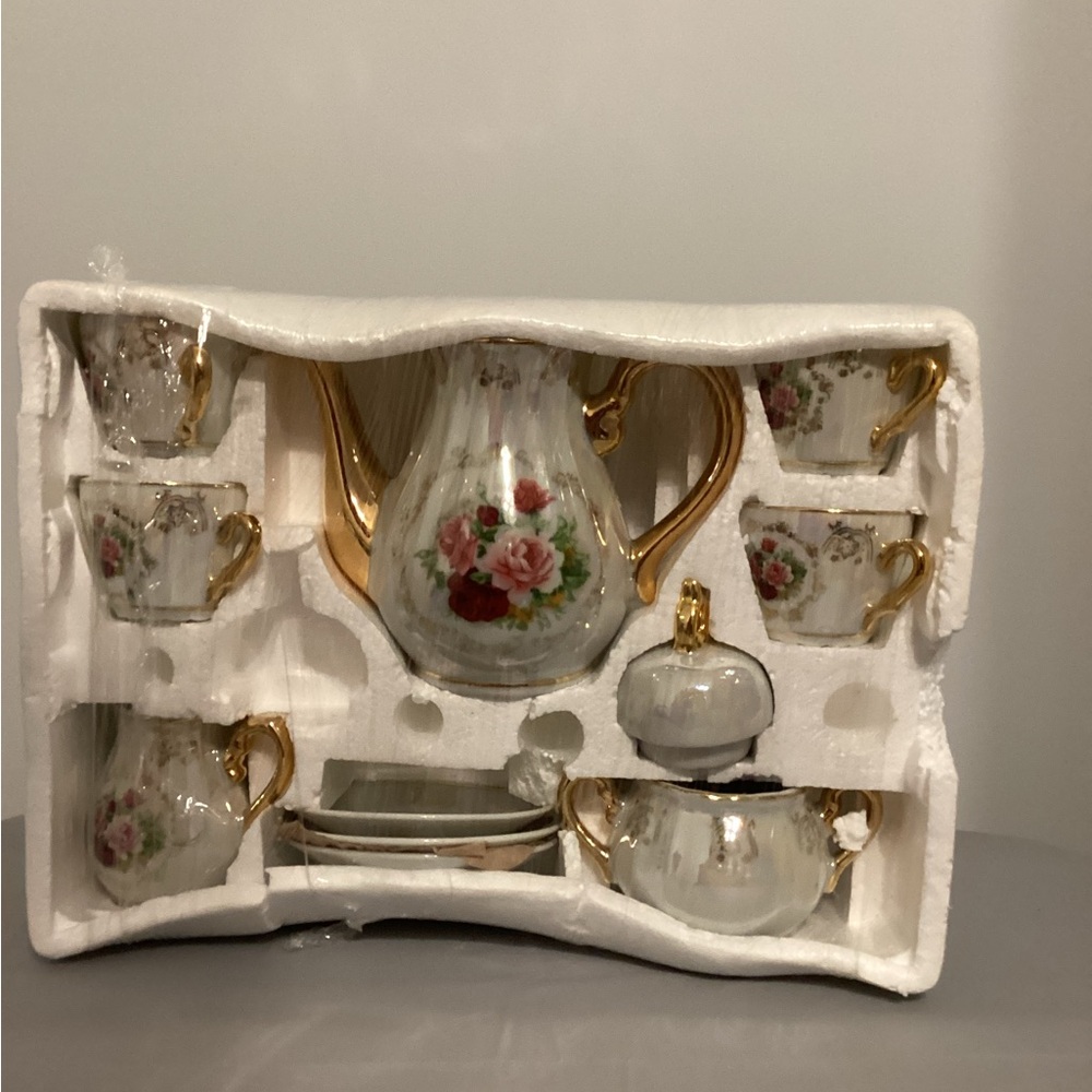 Elegant Floral Tea Set with Gold Accents
